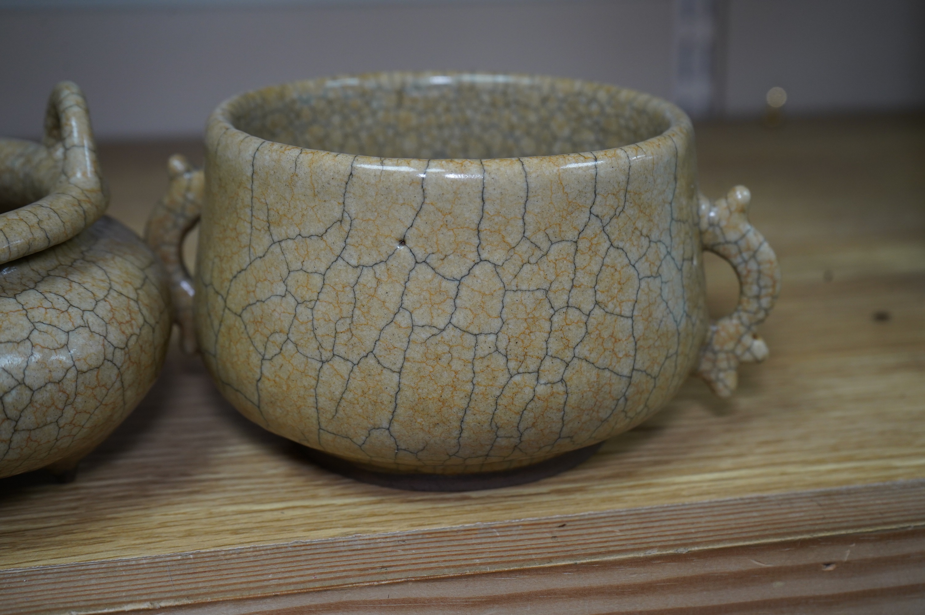 Two buff coloured crackle glazed censers including a tripod example, largest 17cm wide. Condition - good
